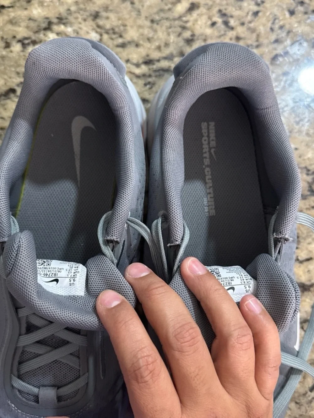 Nike Men’s Light Gray Athletic Sneakers with White Swoosh